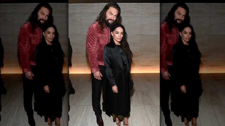 Jason Momoa and Lisa Bonet posing