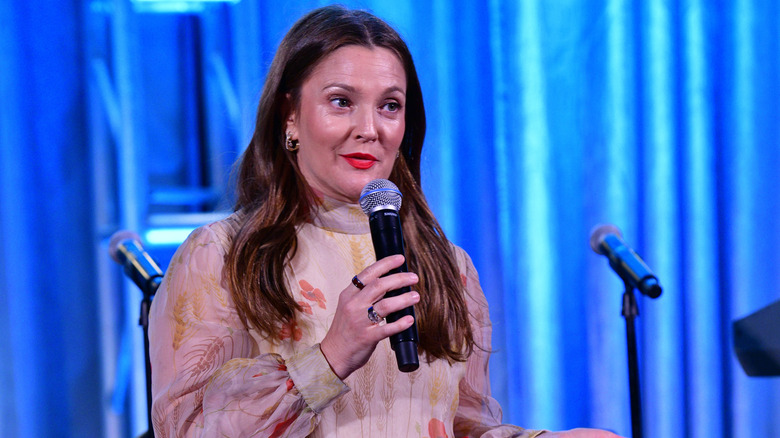 Drew Barrymore speaking at an event