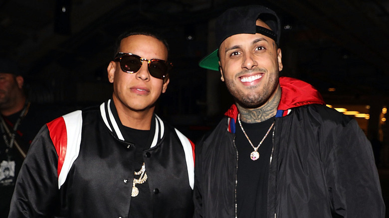 Daddy Yankee and Nicky Jam smiling