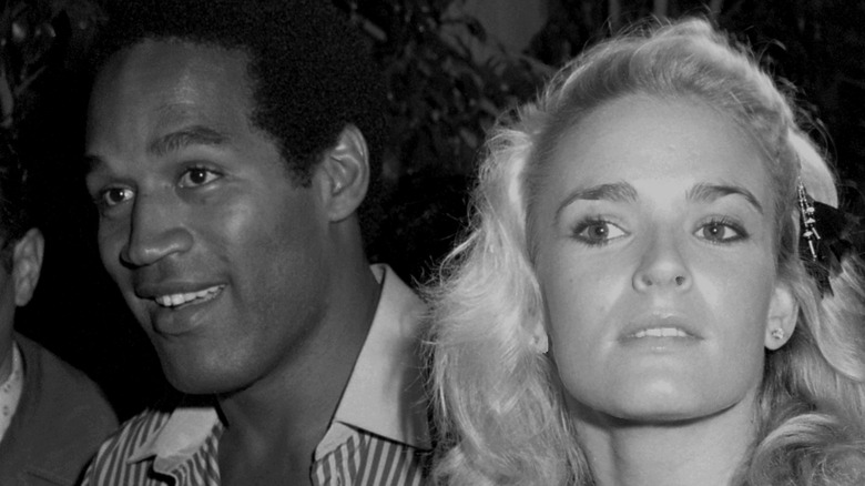 Nicole Brown Simpson looking away from O.J. Simpson