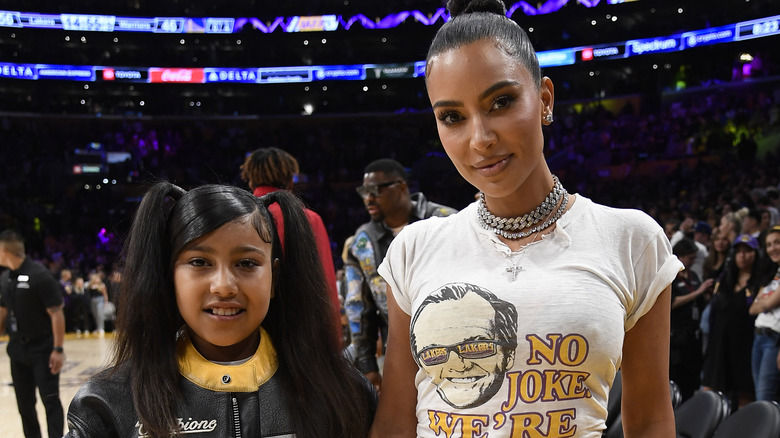 Kim Kardashian and North West at a Lakers game in 2023