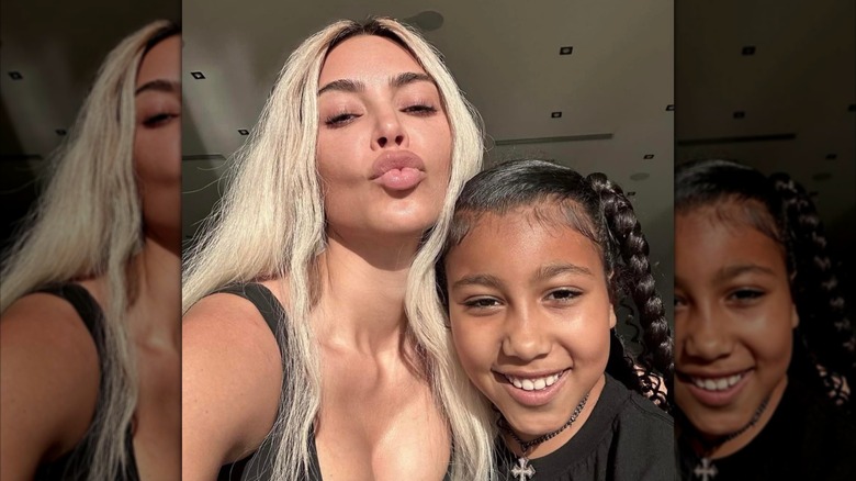 Kim Kardashian and North West taking a selfie.