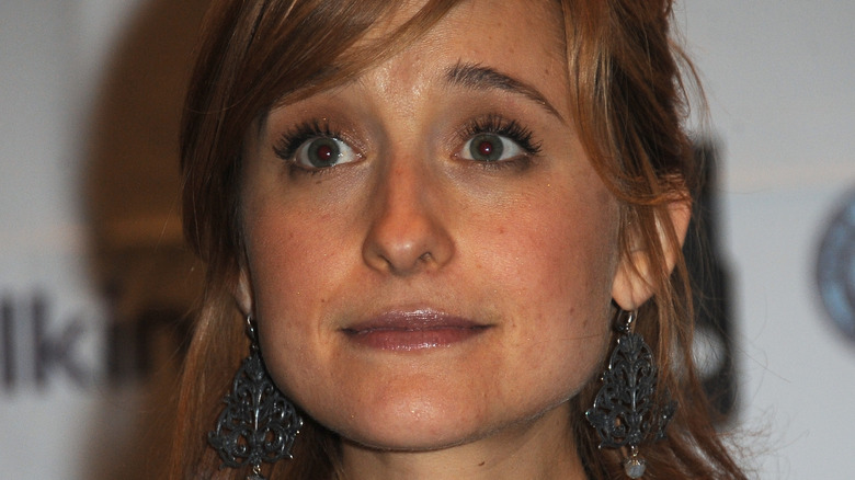 Allison Mack posing