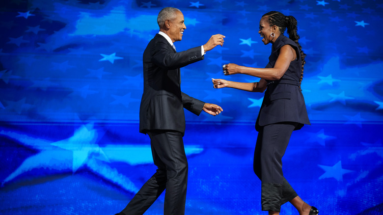 Barack Obama greeting Michelle Obama