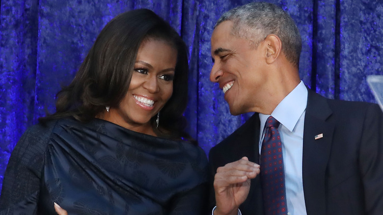 Barack Michelle Obama laughing talking