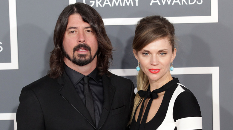 Dave Grohl and Jordyn Blum posing