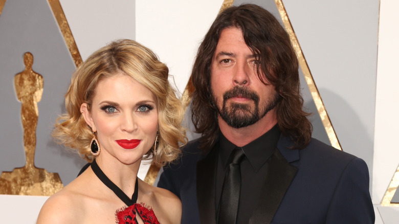 Dave Grohl and Jordyn Blum posing