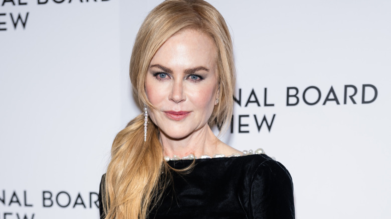 Nicole Kidman, smiling on red carpet