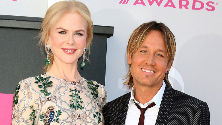 Nicole Kidman and Keith Urban smiling on a red carpet