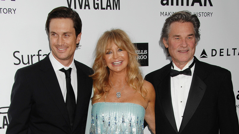 Oliver Hudson, Goldie Hawn, and Kurt Russell smiling together