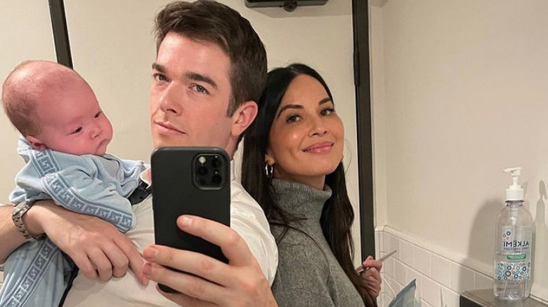 John Mulaney, Olivia Munn and their son Malcolm pose for a selfie