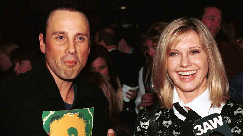 Olivia Newton-John smiling with ex-husband Matt Lattanzi