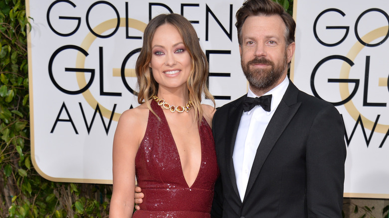 Olivia Wilde and Jason Sudeikis pose 