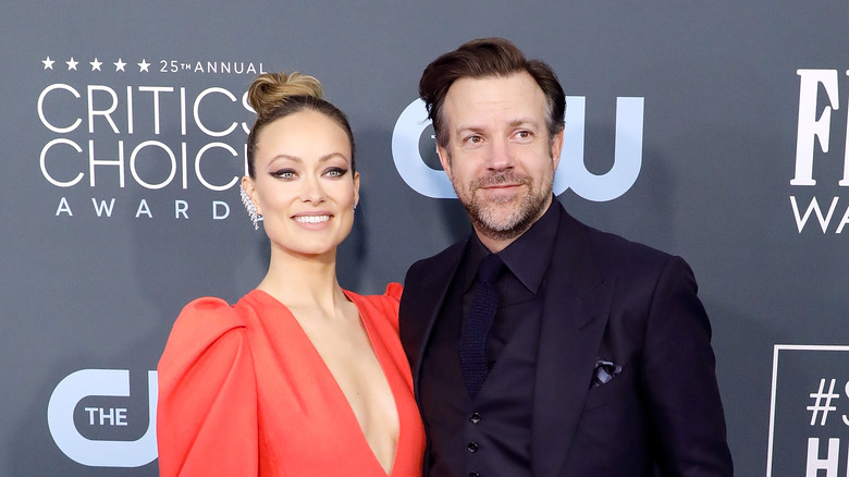 Jason Sudeikis and Olivia Wilde pose 