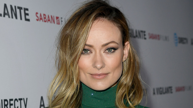 Olivia Wilde green turtleneck