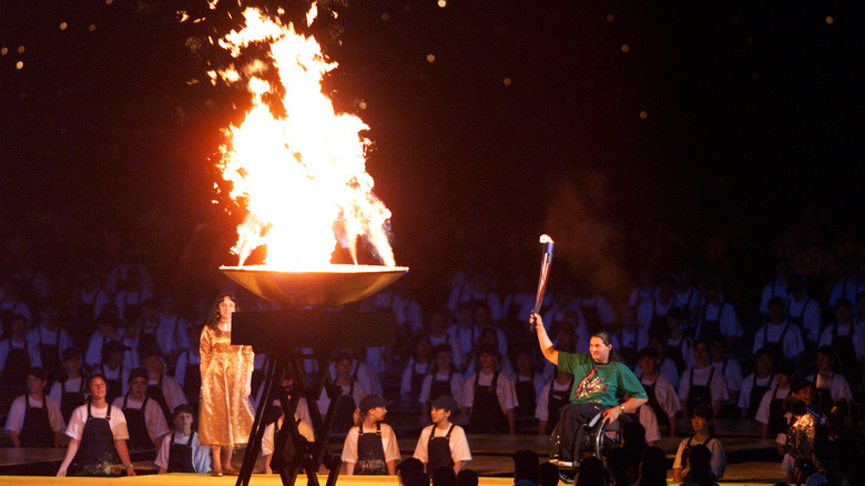 Louise Sauvage lighting the cauldron at the 2000 Paralympics