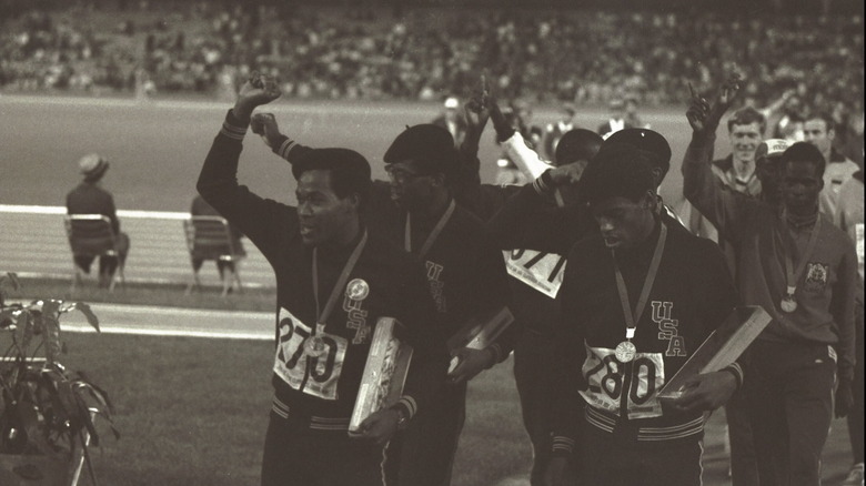 US men's team raising their fists