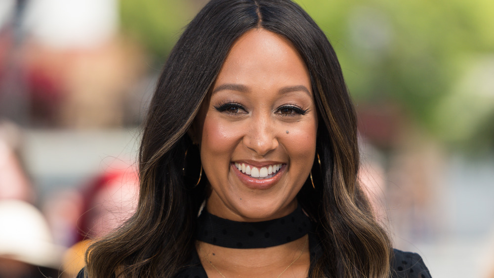 Tamera Mowry-Housley smiling