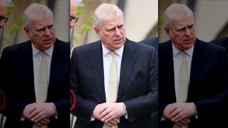 Prince Andrew hands clasped