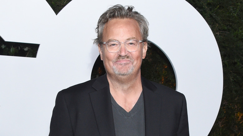 Matthew Perry wearing glasses