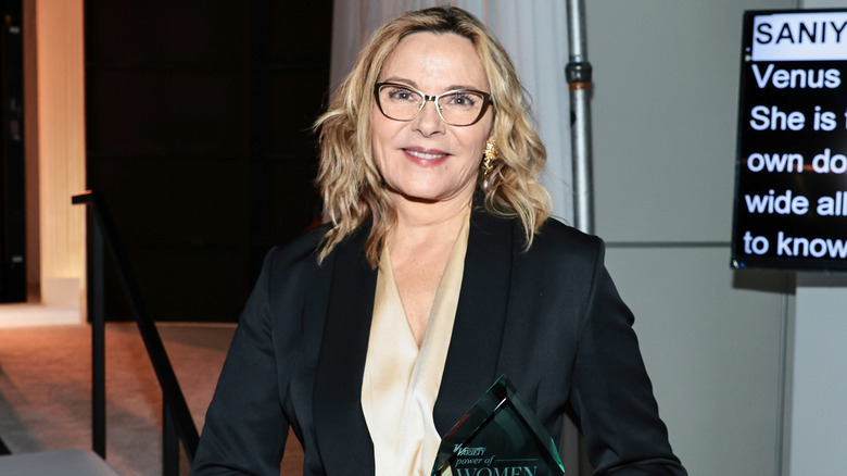 Kim Cattrall with her award at a Power of Women event in May 2022.