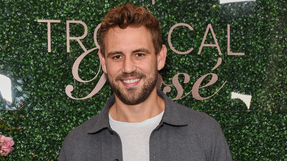 Nick Viall smiling at an event