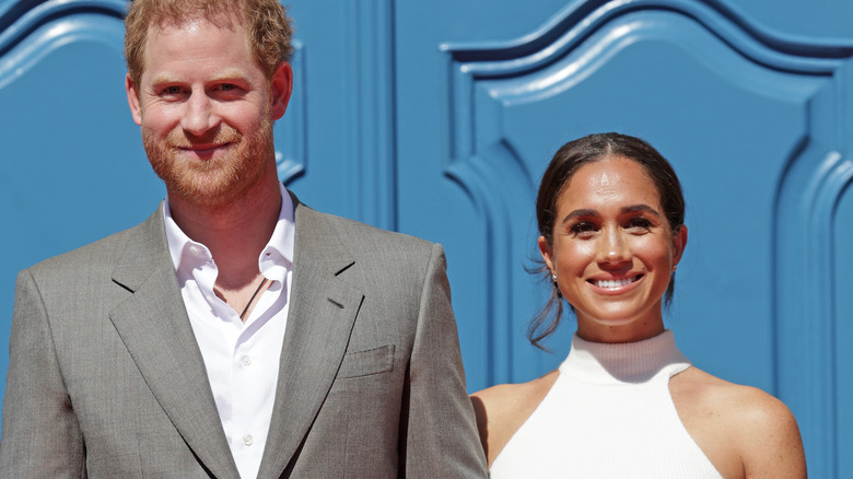 Prince Harry and Meghan Markle smiling