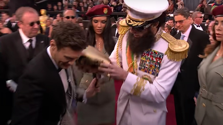 Ryan Seacrest and Sacha Baron Cohen on red carpet