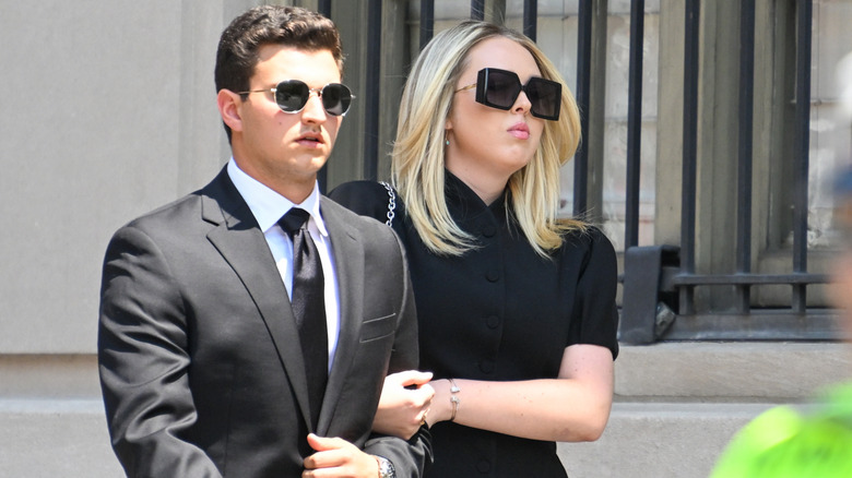 Michael Buolos and Tiffany Trump walking