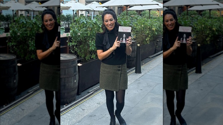 Joanna Gaines holding book