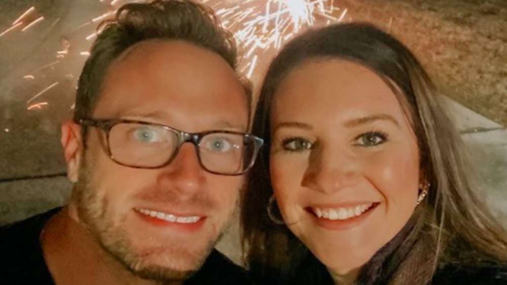 Danielle Busby and Adam Busby take a Christmas selfie