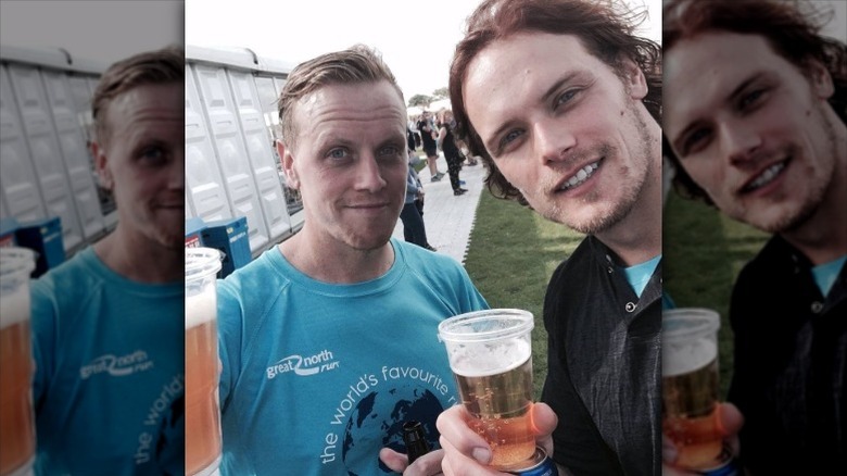 Sam and Cirdan Heughan take selfie holding beers