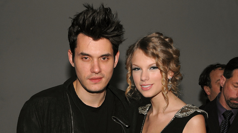 John Mayer and Taylor Swift smiling