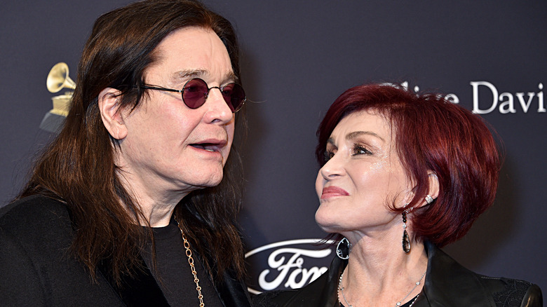 Ozzy and Sharon Osbourne posing at pre-Grammy event 2020