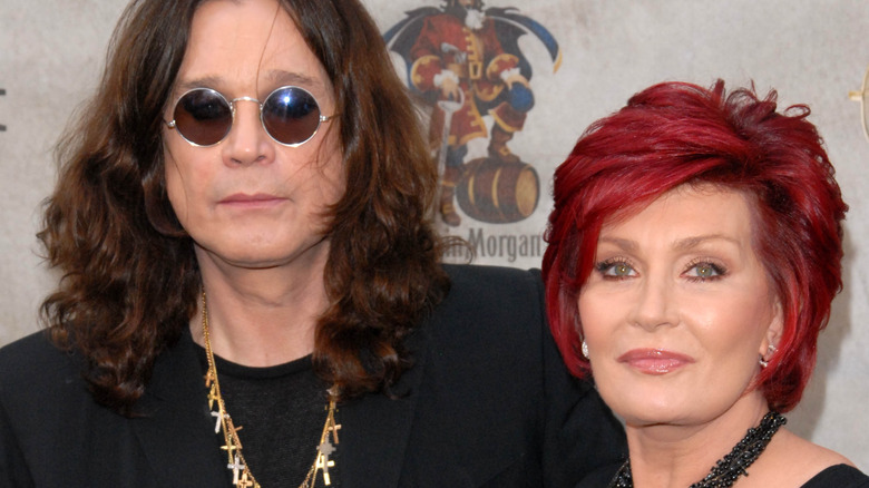 Ozzy Osbourne and Sharon Osbourne posing