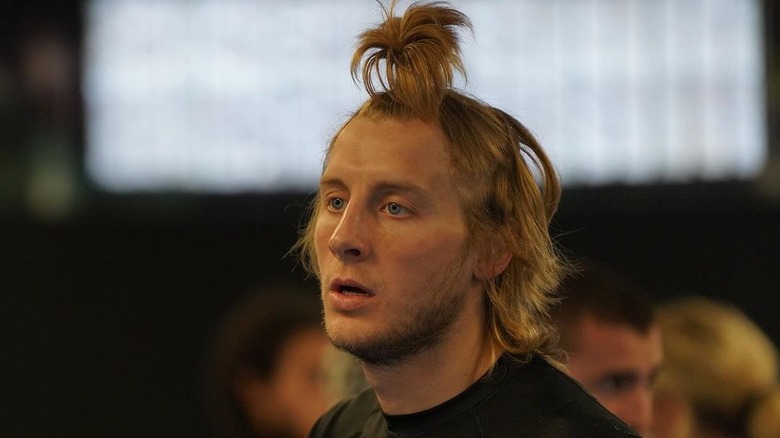 Paddy Pimblett wearing part of his hair tied up