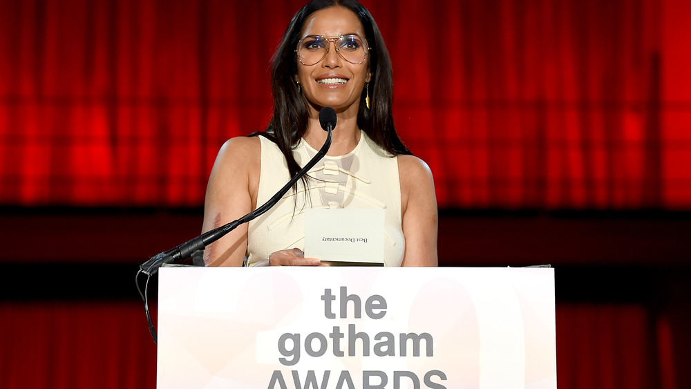 Padma Lakshmi at a podium 