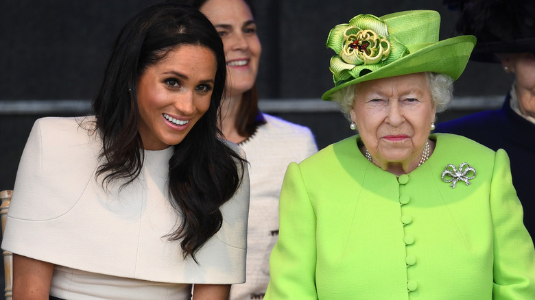 Meghan Markle seated beside Queen Elizabeth