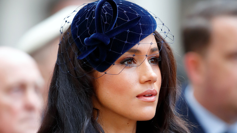 Meghan Markle wearing blue hat