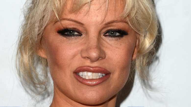 Pamela Anderson posing for a photo