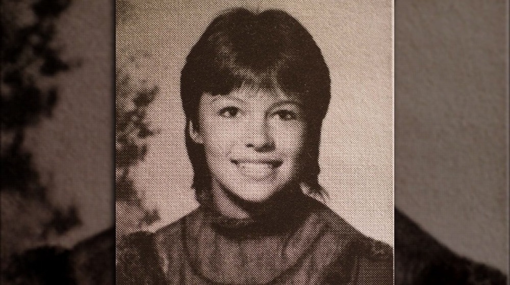 Pamela Anderson sitting for a portrait in high school