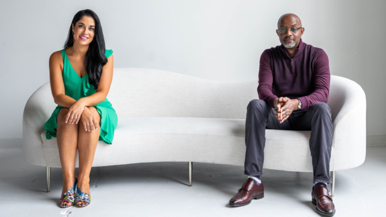 Dr. Viviana Coles and Pastor Calvin Roberson seated on a couch 