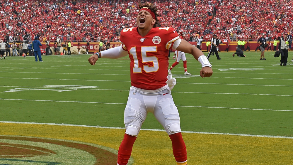 Patrick Mahomes standing on the football field