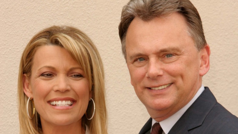 Pat Sajak and Vanna White on red carpet