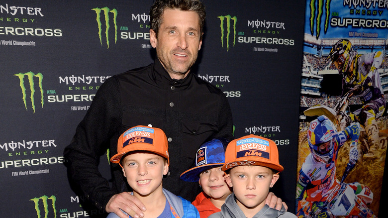 Patrick Dempsey posing with his sons