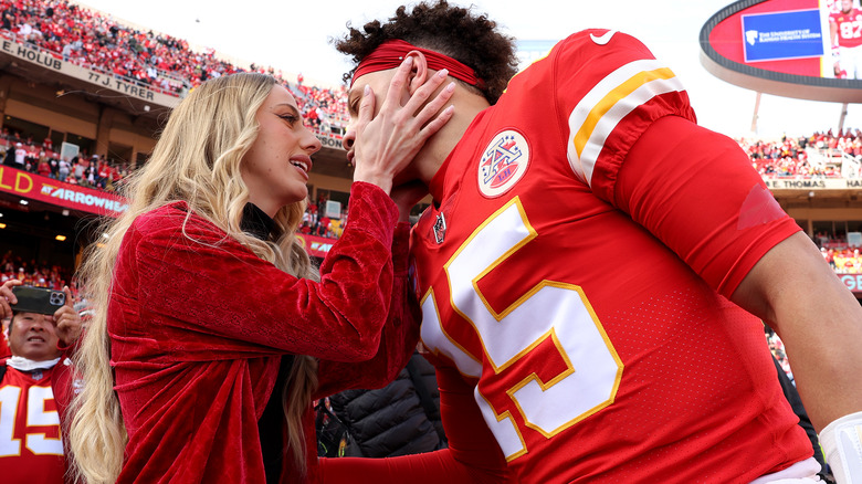 Brittany Matthews and Patrick Mahomes on the field