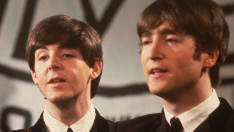 Paul McCartney and John Lennon performing