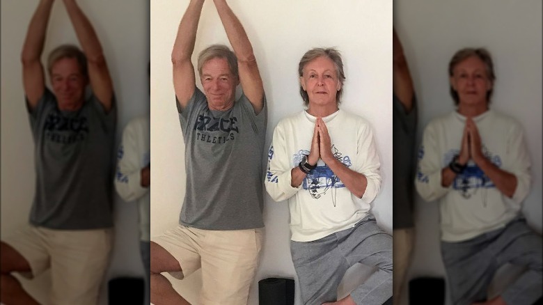 John Eastman and Paul McCartney doing yoga