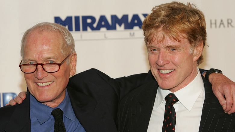 Paul Newman and Robert Redford at Miramax event, smiling