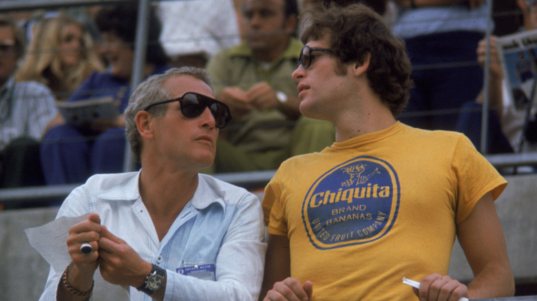 Paul Newman talking with son Scott Newman